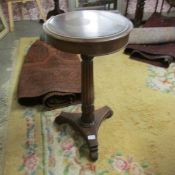 A small mahogany occasional table.
