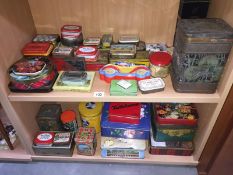 A large quantity of collectors tins