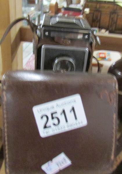 A Zeiss Ikon 'Ikoflex' camera with case, untested.