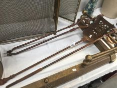 A Victorian iron set of fire irons