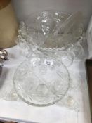 A large punch bowls and cups (8 clips) and a matching fruit bowl