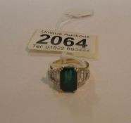 An 18ct emerald and diamond ring, emerald approximately 3.