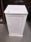 A Victorian over painted pine pot cupboard