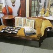 A newly upholstered Victorian mahogany chaise longue.