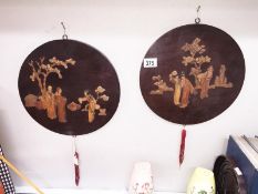 A pair of 19th century Japanese wall plaques.