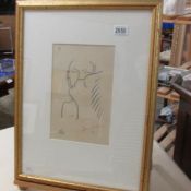 A Jean Cocteau (1889-1963) print depicting 2 faces, stamped and signed in coloured pencil.