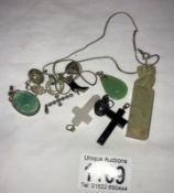 A mixed lot of jewellery including silver, crosses & earrings etc.
