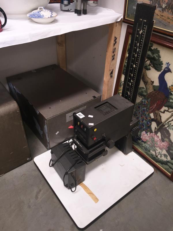 A colour enlarger and a Kodak accessory box with contents, untested.
