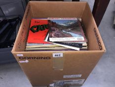 A box of over 90 LP and 45rpm records on classical music, film & TV themes, musicals etc.