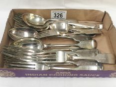 A quantity of silver plate spoons and forks.