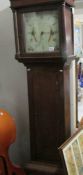 An oak cased Grandfather clock with painted dial marked Hargreaves, Settle.