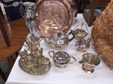 A silver plate tea set, egg cup stand etc.