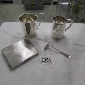 2 Silver Christening mugs, a silver pusher and a silver cigarette case.