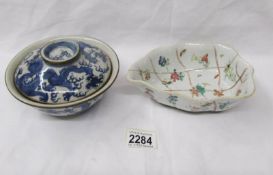 A Chinese lidded dish and another Chinese dish with crack.