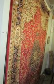A red ground Keshan carpet, 280 x 200 cm.