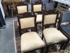 A set of 4 Edwardian upholstered dining chairs