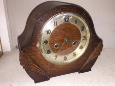 A 1930's oak mantle clock 'Frank Stewart Hereford'