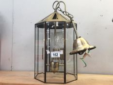 An antique brass effect bevelled glass hall lantern