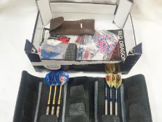 A box of vintage darts including bulls eye flights.