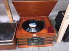 A Steepletone retro style record player CD radio.