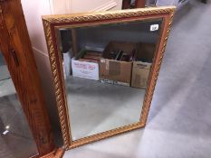 A good quality gilt framed bevel edged mirror.