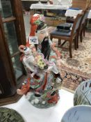 A large Chinese figure with slight damage in places