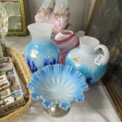 A German hand blown turquoise coloured glass vase with matching jug,