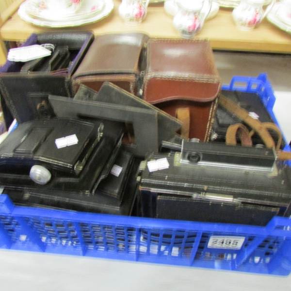 A quantity of Ziess Ikon camera items including 'Ideal Tessar Lens', roll film backs, slides etc.