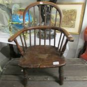 A Victorian child's Windsor chair.