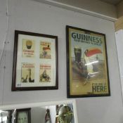 2 framed and glazed Guiness adverts.