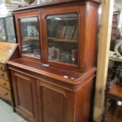 A Victorian mahogany glazed top 2 door bookcase.