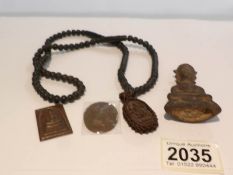 7220 4 assorted far east items including pendant necklace and Buddha.