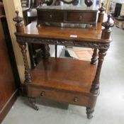 A superb quality Victorian walnut 2 tier stand with drawer.