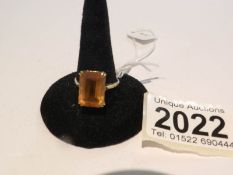 A 9ct gold ring set with citrine, hall marked Birmingham 1965, approximately 3 grams, size Q half.