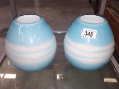 A pair of art glass vases.