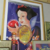 A framed and glazed Snow White movie poster.