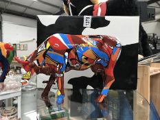 A boxed Cow Parade 'Psycoelicowwow'