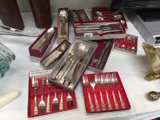 A quantity of silver plated cutlery sets