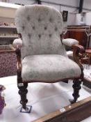 A Victorian mahogany upholstered carver chair