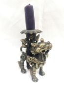 A 19th century bronze Chinese dragon candle holder.