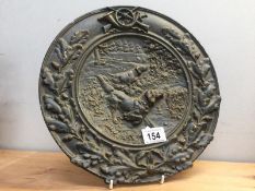 A late 19th / early 20th Century pewter plaque of gun dogs