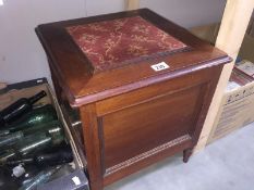 A Victorian mahogany commode with carpet panel top