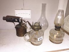 2 hand oil lamps and a blow lamp