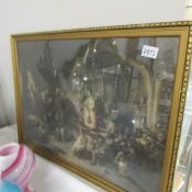 A framed and glazed Victorian family scene.