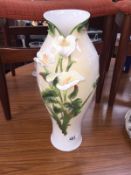 A tall Graff porcelain vase.