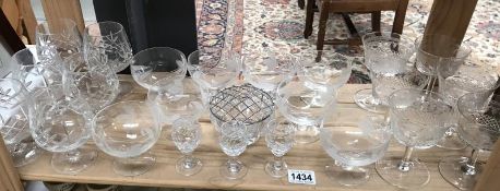 A selection of drinking glasses including etched