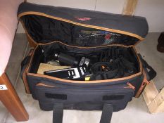 A camera holdall and contents including Hanimex T236 flash and other accessories