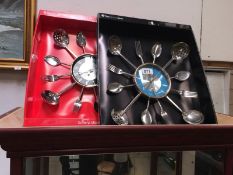 2 boxed The Kitchen Shop cutlery clocks