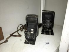 A Zeiss Ikon camera and an ICA Dresden Compur folding camera