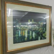 A large framed and glazed print of Lincoln Cathedral from Brayford Wharf East at night from an